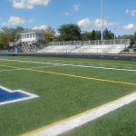 Portable bleachers for extra seating along a football field in Ohio